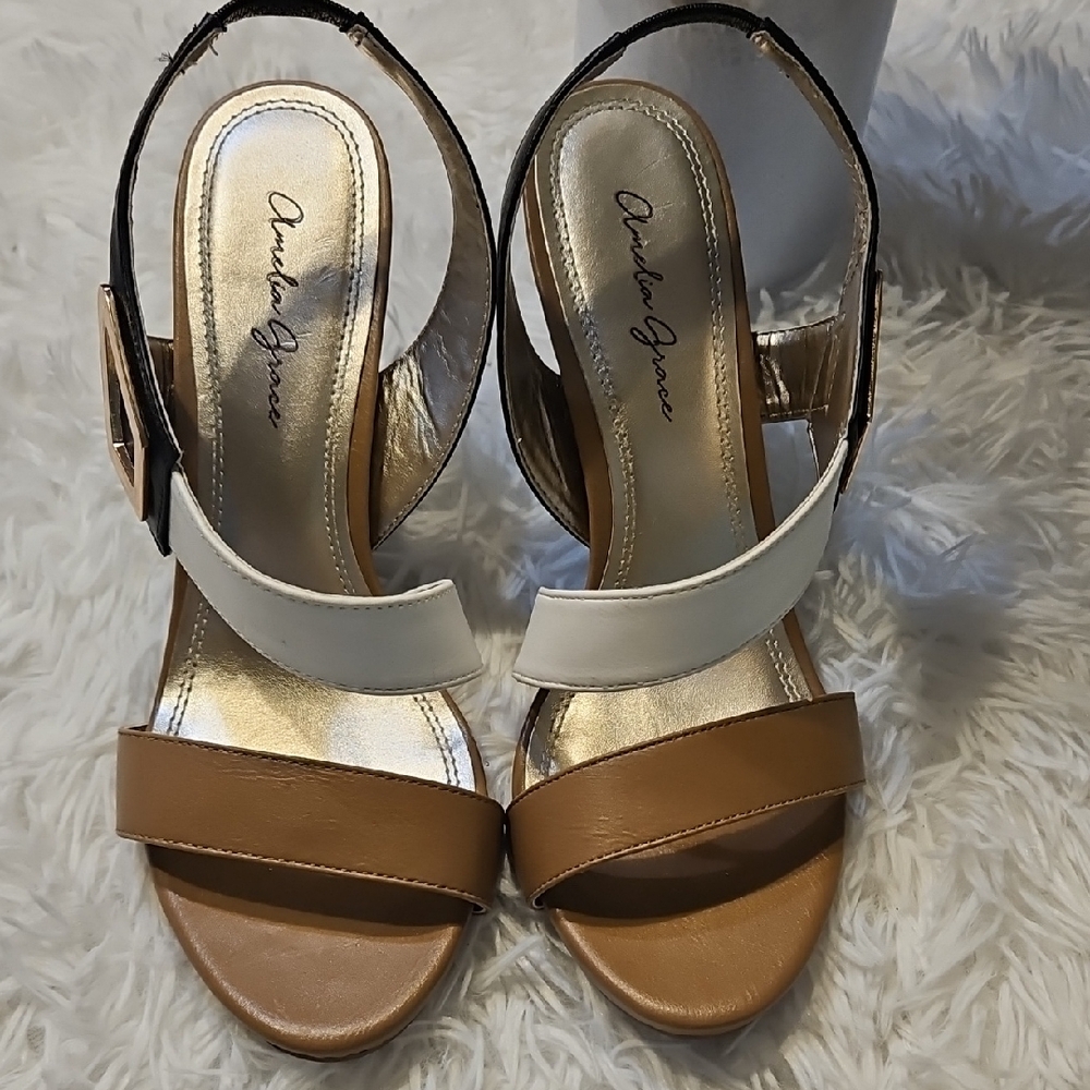 Chic Tan and White Sandals by Charles Grace